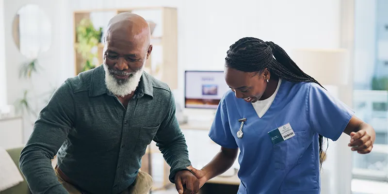 Nurse providing wound care and medication support during home recovery